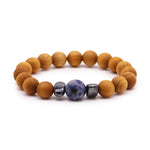 Load image into Gallery viewer, Cedarwood Throat Chakra Bangle with Sodalite
